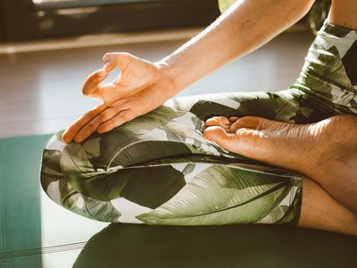 Close up of hands in a stable yoga position